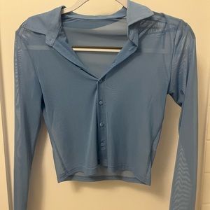 Long sleeve blue mesh button down.